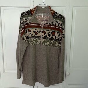 Mixed animal print quarter zip sweatshirt. NWOT